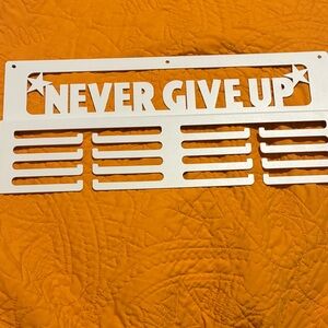 “Never Give Up “ Medal Holder